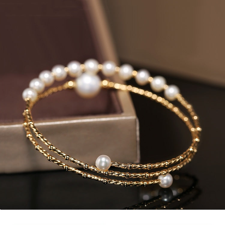 Pulsera elástica multicapa de perlas de agua dulce ligeras y resistentes para mujer