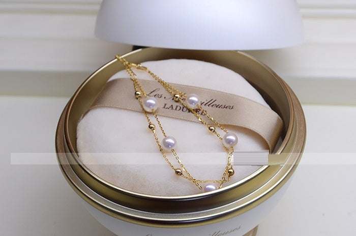 Bracelet double couche réglable en or 18 carats avec perles d'eau de mer