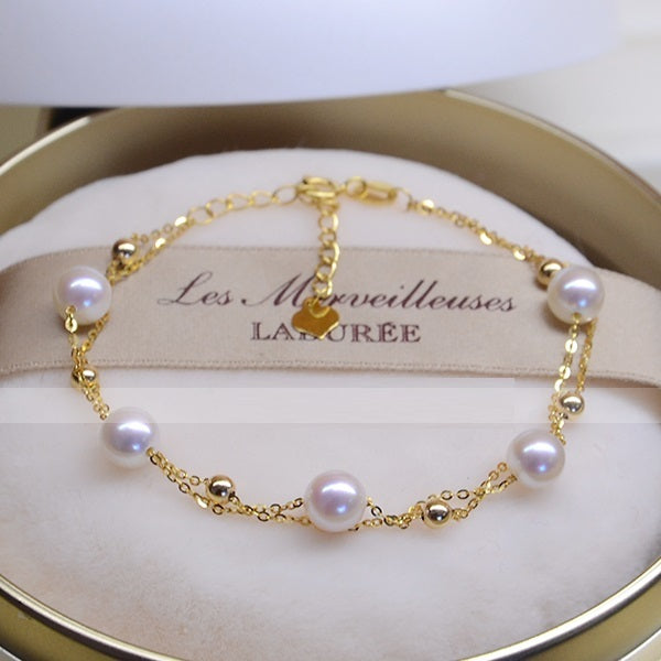 Bracelet double couche réglable en or 18 carats avec perles d'eau de mer