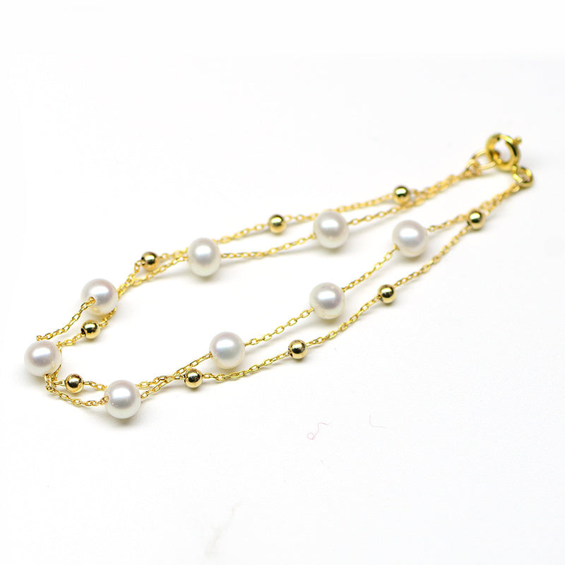Bracelet double couche réglable en or 18 carats avec perles d'eau de mer